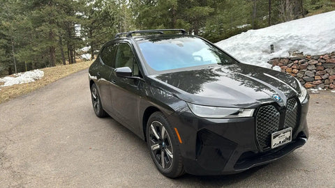 Front-side view of BMW with Roof Rack Cross Bars For iX 2020 And Up No Drilling Aluminum T Slot Design Lockable