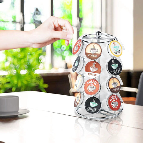 Person using K Cups Pod Carousel Cup Holder With 24 Slots Spins 360 Degrees Lazy Susan Chrome Finish on kitchen counter