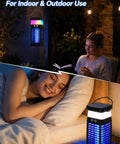 Woman reading by Solar Powered 3 In 1 Mosquito Zapper With Flickering Flame And RGB Light Totally Cordless Waterproof Bug Repellent.