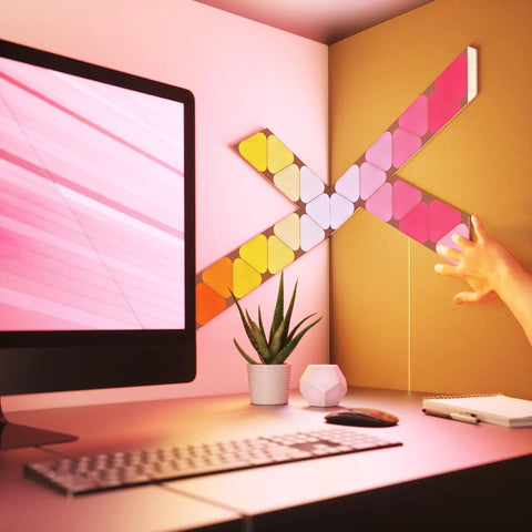 Flexible Linkers For Shape Panels, 3 Pack, Bendable Corner Connectors setup on a wall with colorful panels, desk in foreground.