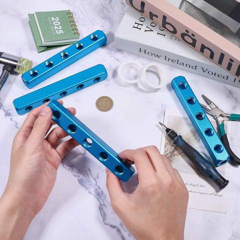4 Pack Aluminum Pneumatic Manifold Block With 2 Inlets And 5 Outlets, tools and setup items on marble surface