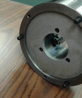 Premium 8 Inch 3 Jaw Self Centering Scroll Lathe Chuck With Front Mount and Two Piece Reversible Jaws view of back with screws and circular design.