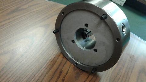 Premium 8 Inch 3 Jaw Self Centering Scroll Lathe Chuck With Front Mount and Two Piece Reversible Jaws view of back with screws and circular design.