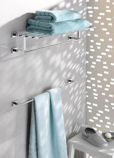 Essentials Cube 24 Inch Towel Rail In StarLight Chrome, wall mounted with blue towels, sleek minimalist square design for modern bathrooms.