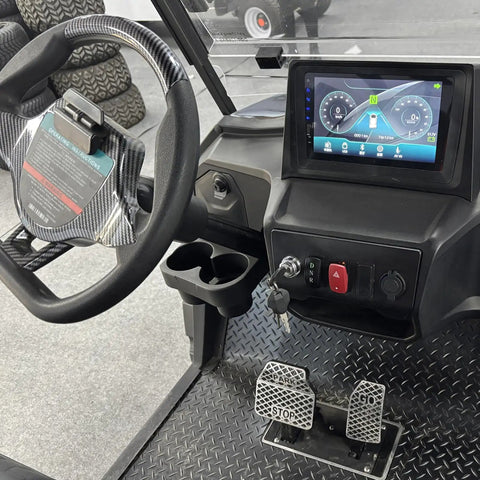 Interior view of Four Seater Electric Golf Cart With 14 Inch Off Road Tires And MacPherson Strut Suspension featuring steering wheel and control panel.