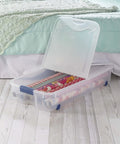 Two Pack 66 Quart Clear Underbed Storage Bins With Low Friction Wheels And Snap Tight Blue Latches storing wrapping paper under bed.