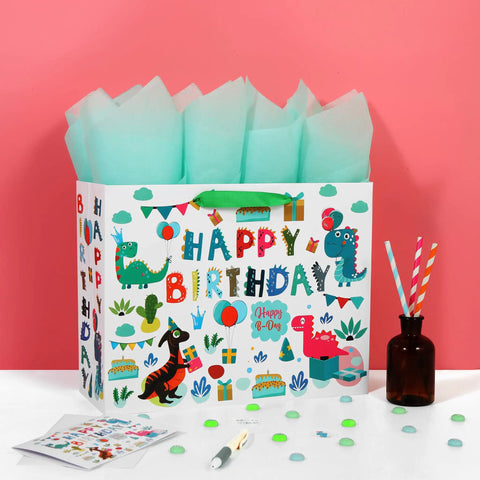 13 Inch White Gift Bag Set With Greeting Card And Tissue Paper, Green Dino Design, Happy Birthday Theme, on pink background