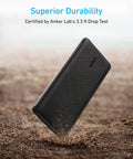 Top Shelf 10000mAh Portable Charger With Hella Fast Usb C Power Delivery And Ultra Slim Profile, shown dropping on a dusty ground.