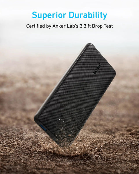 Top Shelf 10000mAh Portable Charger With Hella Fast Usb C Power Delivery And Ultra Slim Profile, shown dropping on a dusty ground.