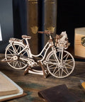 Dutch Bicycle 3D Wooden Puzzle Kit For Adults With Dope Movable Parts And Rear Rack Front Basket Amsterdam Inspired Mechanical Model 1 To 1850 Scale on desk