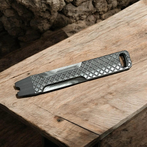 Everyday Carry Mini Pry Bar Keychain With Screwdriver And Box Opener Heavy Duty Stainless Steel EDC Tool on wooden surface