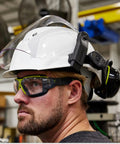 Worker wearing MX350 Clear Anti Fog Safety Eyewear With Gas Resistant Neoprene Strap Built In Brow Guard Soft Nose Piece.