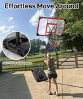 Woman adjusting Kids Adjustable Outdoor Basketball Hoop 4.82 To 8.53 Feet Portable Backyard Driveway Hoop With Enlarged Base And PC Backboard