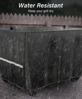 Pizza Oven Cart Table Cover For Outdoor Grills 53 X 26 X 28 In Heavy Duty 600D Weather Resistant Fabric With Drawstring covering a grill in rain.
