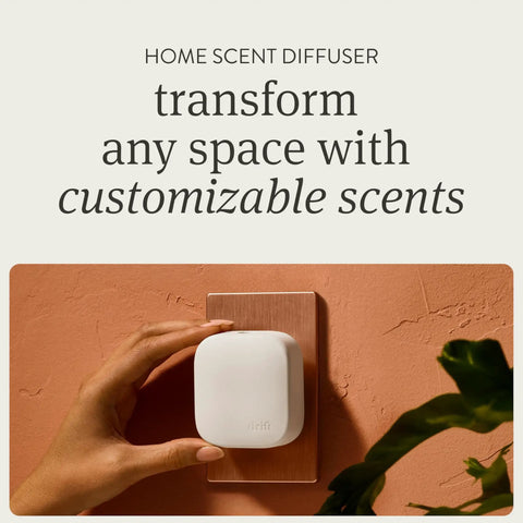 Hand adjusting Teak Scent Diffuser Starter Kit With Adjustable Long Lasting Aroma For Small To Medium Rooms on wall