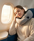 Woman using Memory Foam U Shaped Travel Neck Pillow With Plush Velvet Cover And Breathable Mesh for neck pain relief on airplane