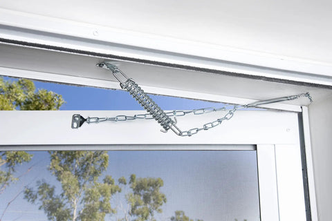 Heavy Grit Zinc Steel Wind Chain For Storm And Full View Screen Doors Adjustable Shock Absorber Retainer mounted on a door frame.