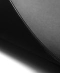 Close-up of black Leather Desk Blotter Pad 17 By 12 Inches Flat Non Slip Waterproof with velvet back showing the non-glare surface.