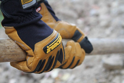 Rugged Rolltop Seamless Fingertips Leather Work Gloves With Kevlar Reinforcements for Maximum Dexterity gripping a wooden handle