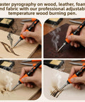 All In One Wood Burning Kit For Beginners And Newbies With Adjustable Temperature Pen Includes 14 Tips, Stand, Gloves, 24 Watercolor Paints, Stencils, Carbon Papers, Sketch Papers, Pencils And 11 Wood Surfaces For DIY Projects, Crafts, And Home Decor showing pyrography tool in use on wood, leather, foam, and fabric