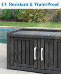 Front view of Two Tier Storage Bench Cabinet For Shoes Waterproof UV Resistant Outdoor Shoe Organizer with two doors in black, outside in rain.