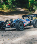 ARRMA Typhon 1 Eight Scale RC Buggy 6S 4WD BLX RTR with TLR Tuned Parts on dirt track, rear-side view