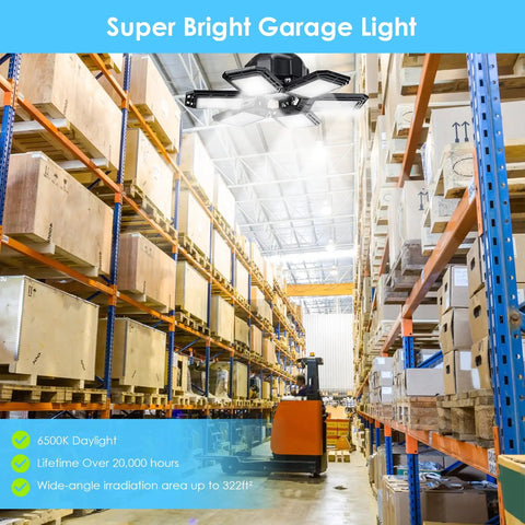 Warehouse lit by 2 Pack Deformable Garage Light With 6 Adjustable Panels 200W 20000LM 6500K Daylight LED Shop Lights