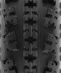 Close-up of Knobby Sport ATV UTV Tires 22x7-10 Tubeless A027 6 Ply tread pattern suitable for all terrain action.