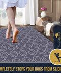 Woman walking on rug with Non Slip Rug Lock Grip For Hard Floors Keeps Area Rugs From Sliding With Cushioned Padding And Floor Protection Pads In Multiple Sizes For 4x7 Rugs Safe Discreet Easy Installation underneath