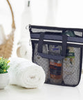 Mesh Shower Bag On The Go With Quick Dry Caddy, Zippered Tote And 2 Pockets, Portable Toiletry Organizer, black, in a bathroom setting