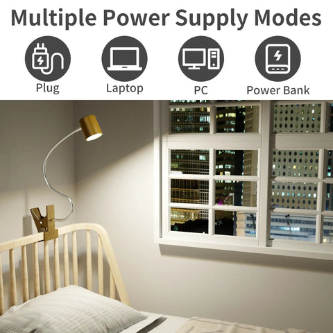 USB Clip Desk Lamp With 360 Gooseneck Reading Light for Home Office on a bedside with city view, 3 color modes, adapter included.