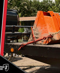 One Quarter To Five Sixteenth Inch Ratchet Binder With Grab Hooks For Grade 70 Chains in use on flatbed trailer