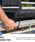 Close-up of Comfy Stadium Bleacher Seat With Back Support And Thick Padded Cushion Includes Shoulder Strap, attached to bleacher.