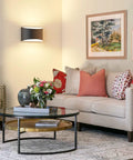 Straight Up Modern Matte Black LED Wall Sconces Set Of Two Hardwired Fixtures With 3000K Warm White Glow For Chill Living Vibes And Top Shelf Home Decor Pieces mounted above a beige sofa.