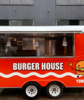 Commercial Mobile Food Cart And Towable Vending Trailer For Street Sales Features Ready To Roll Hot Dog And Ice Cream Stand Loaded With Barbecue Gear For A Solid Side Gig, vibrant orange burger trailer with front serving window.