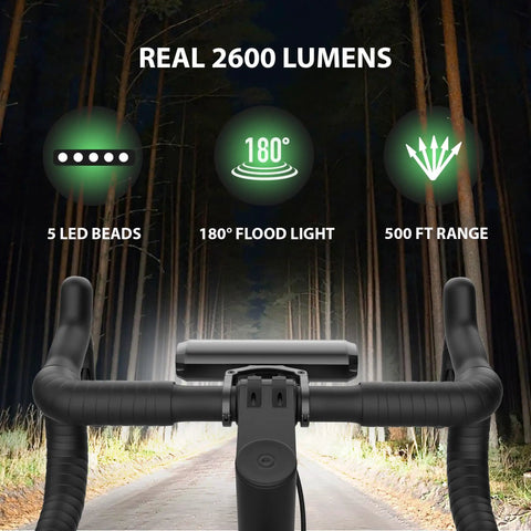 Lit Ultra Bright 2600 Lumen Bike Light Set for Night Riding showing handlebars, LED features, and range at night