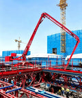 Hydraulic Mobile Concrete Placer And Distributor For Floor Slabs Foundations Bridges Warehouses And Commercial Construction Projects Workhorse With High Flow And Smooth On Site Pouring And Easy Transport, red boom at construction site