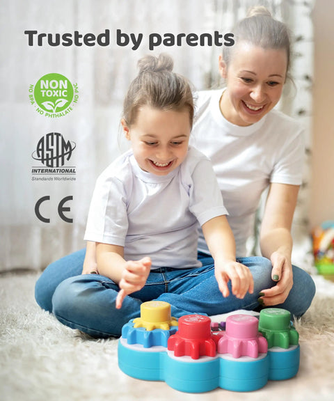 Screen Free Kids DJ Mixer And Manual Music Gear Station Featuring Twin Beat Sliders Scratch Wheel And Interactive Ear Training For Young Pros Whose Grooves Always Hit Different being used by a child and parent.