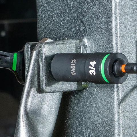 Deep Well Impact Socket Set With Half Inch Drive SAE Color Coded 14 Piece in use, showing 3/4 inch socket on metal surface.