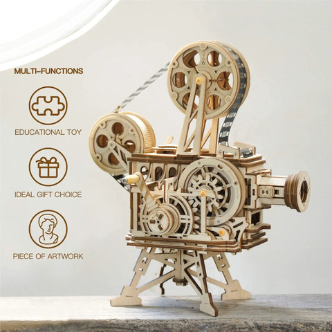 Vitascope 3D Wooden Puzzle Kit For Adults showing assembled vintage cinema projector model with gears and reels.