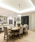 Modern dining room with 4 Inch Square Wafer LED Recessed Downlight With Ultra Thin Trim, Matte White Finish, illuminating space.