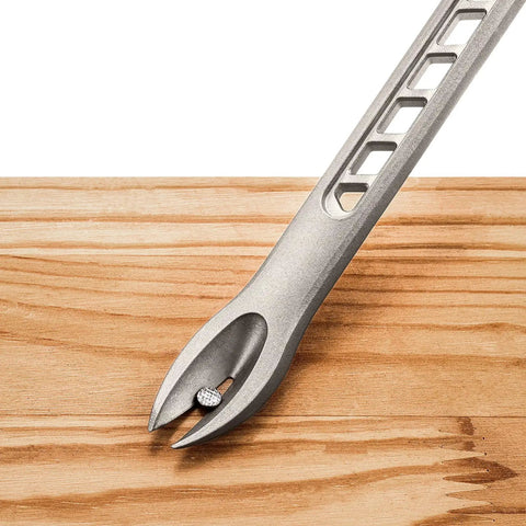 12 Inch Titanium Nail Puller Dual Ended Cats Paw Pry Bar Crowbar for construction shown removing a nail from wood