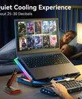 Eight Fan Gaming Laptop Cooling Pad for 15 to 17.3 Inch Notebooks with RGB lighting and phone stand in a gaming setup