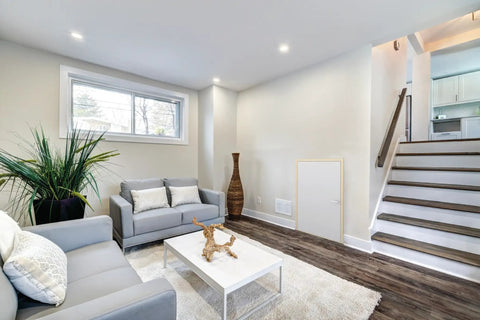 Heavy Duty Insulated Wooden Wall Hatch Access Door White Finish R Value 5.2 Smart Trim Kit Included Fully Assembled in living room.