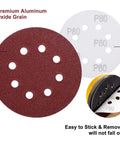 Heavy Duty 150 Pack 80 Grit Hook And Loop Sanding Discs 5 Inch 8 Hole Anti Clog Coating showing red aluminum oxide disc.