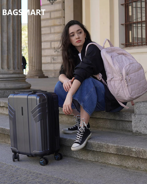 BAGSMART expandable carry-on luggage, gray polycarbonate hard-shell with 4 spinner wheels; pink backpack.