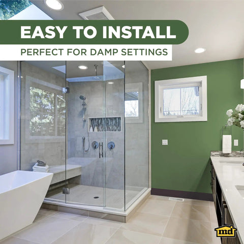 Modern bathroom with glass shower, 4 Inch By 60 Foot Dry Back Vinyl Wall Base Flexible Trim With Toe Easy Install Molding in brown.