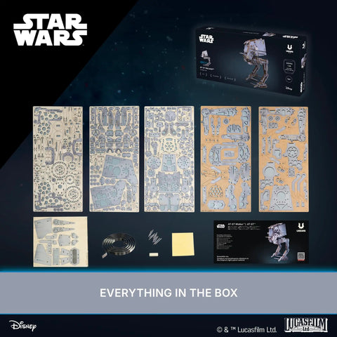 Wooden Star Wars AT ST Walker 3D Puzzle Featuring Smooth Shifting Gear System That Delivers Real Walking Motion Knockout DIY Brain Teaser And Straight Fire Collector Grade Hobby Kit parts layout in box.