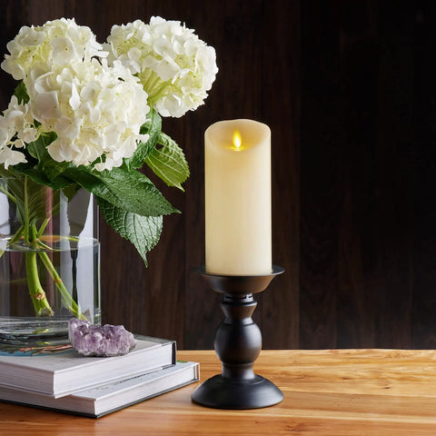 Scalloped Edge Flameless LED Candle Ivory 3x6.5 Inch Battery Operated With Moving Flame Real Wax Pillar on black holder