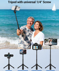 Couple at beach using tripod with universal 1/4" screw for webcam, action camera, digital camera, and smartphone.